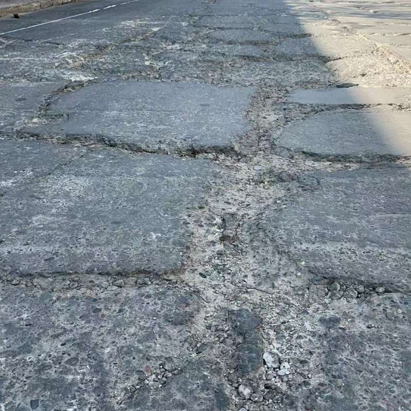 莲湖路面起砂露石子修补料